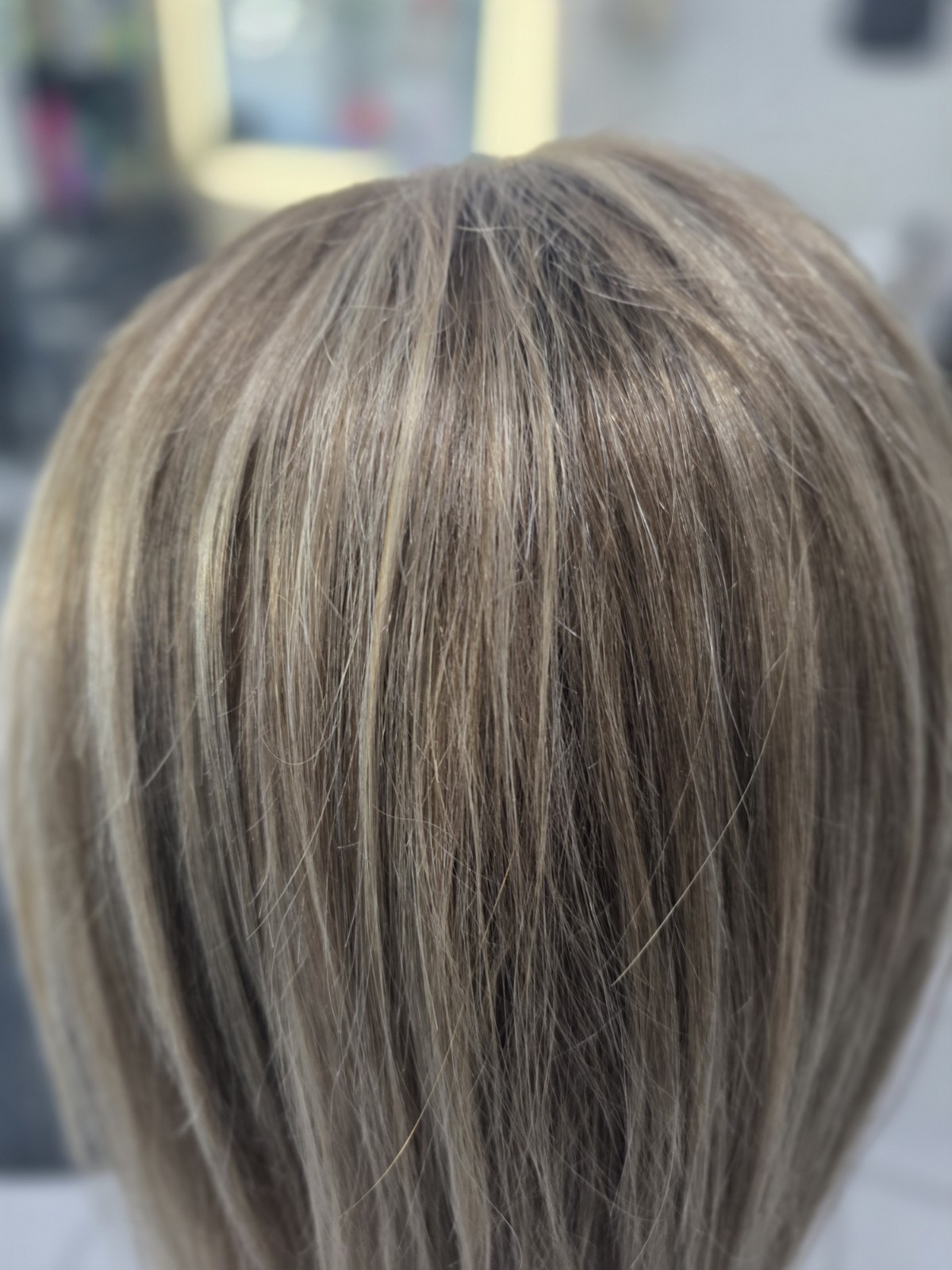 30-inch custom-colored wig crafted from virgin human hair, designed to emulate