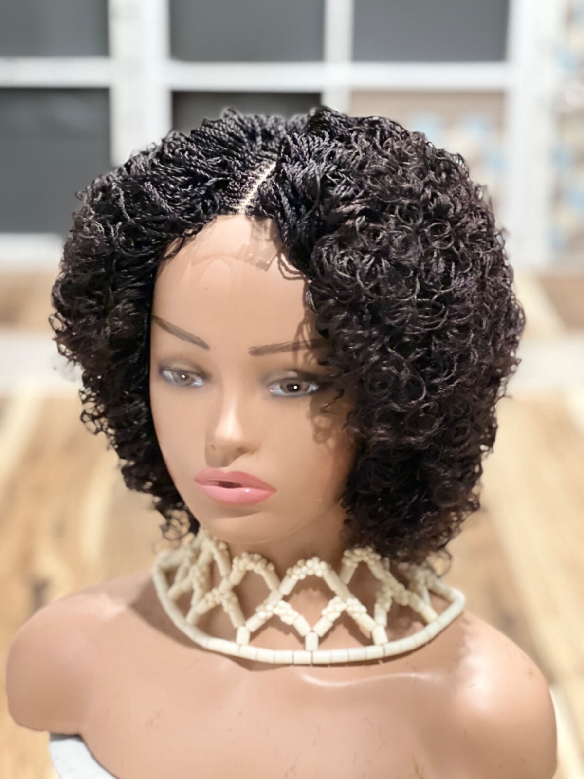 Braided micro twist afro curly wig. just as pictured. color is Brown mix