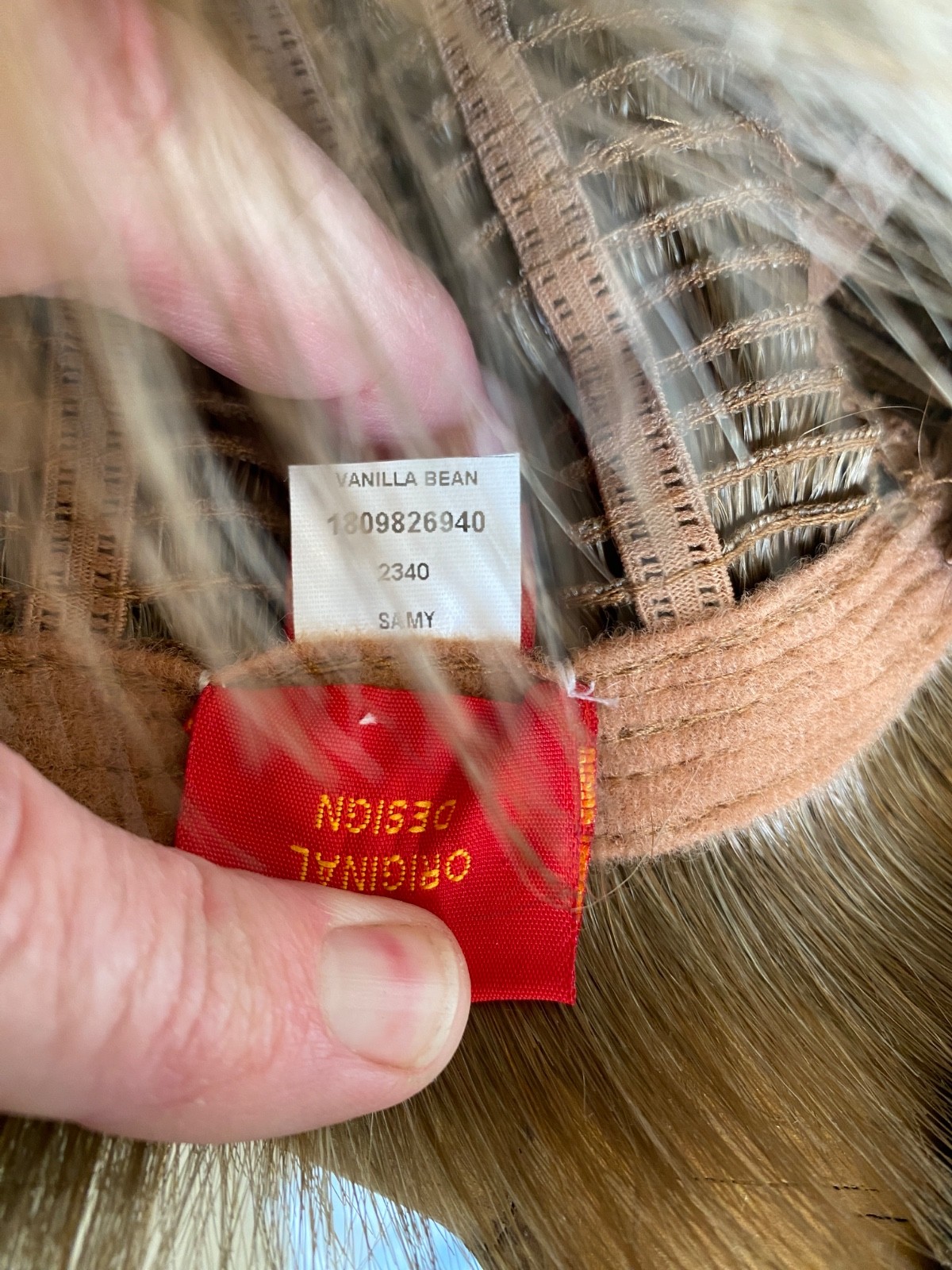 Rene of Paris: Wig – Ash Blond. Comes with stand brush and wig shampoo. (Boxed)
