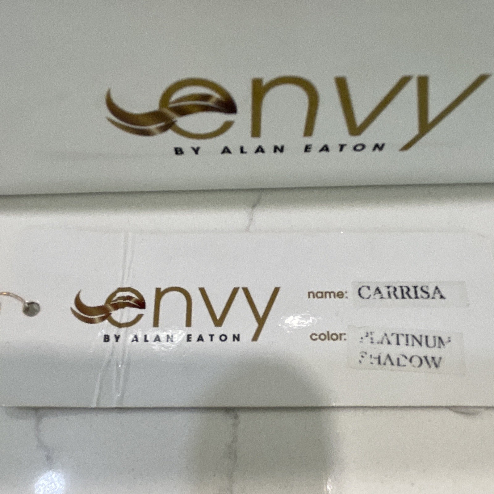 Envy by Alan Eaton Carrisa Synthetic Layered Bob Wig Classic Cap Platinum Root