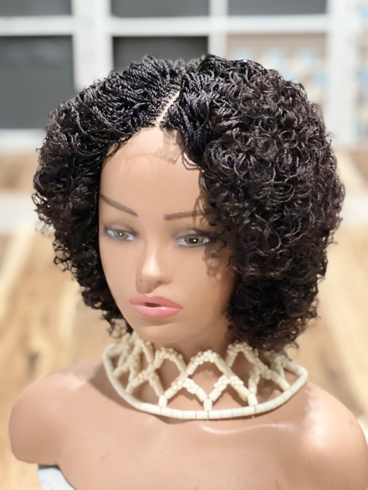 Braided micro twist afro curly wig. just as pictured. color is Brown mix