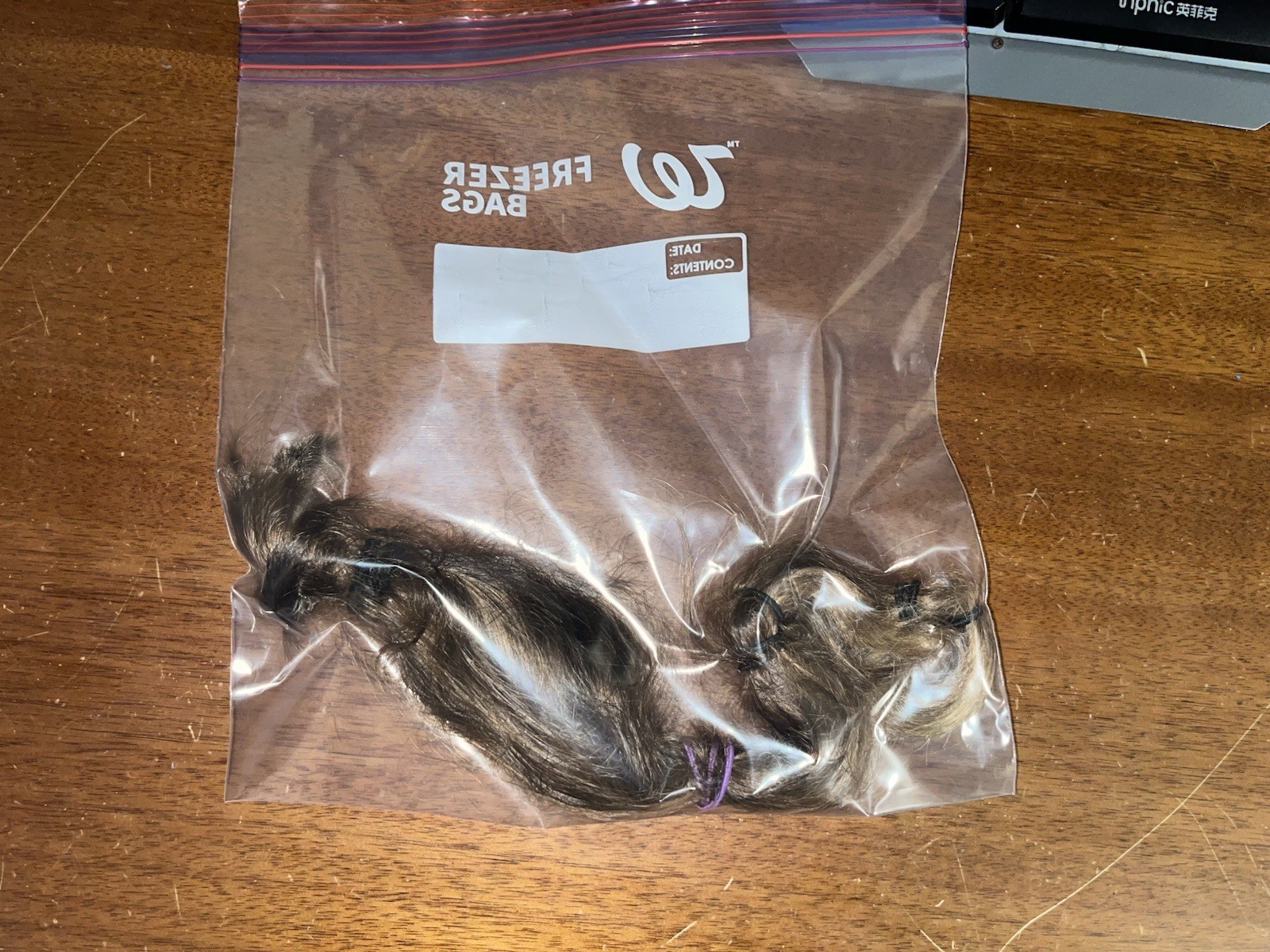 natural untreated medium/dark blonde hair, 11-12inch long, 3inch diameter