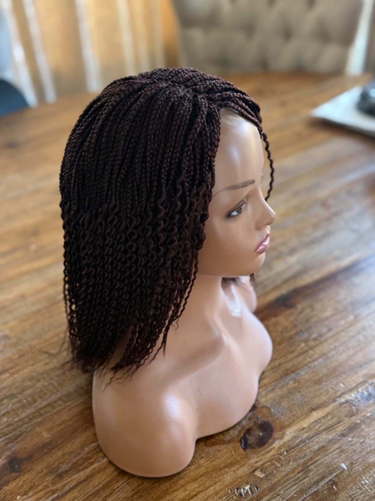 braided curly wg. It’s made on a closure. Brown watermelon shorty 12”wig