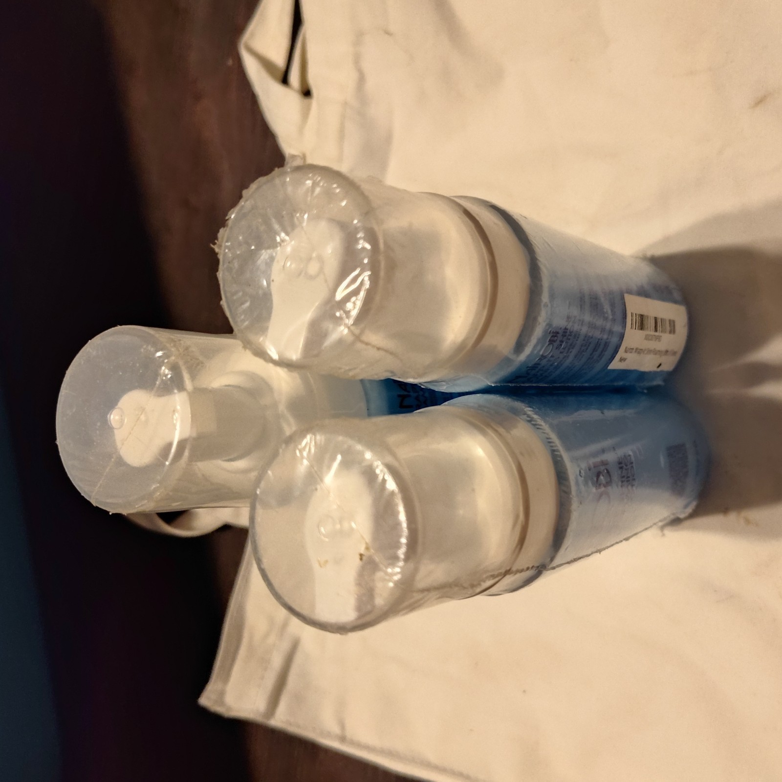 Nairobi wrapp-it shine loaming lotion 3 bottles 8oz each