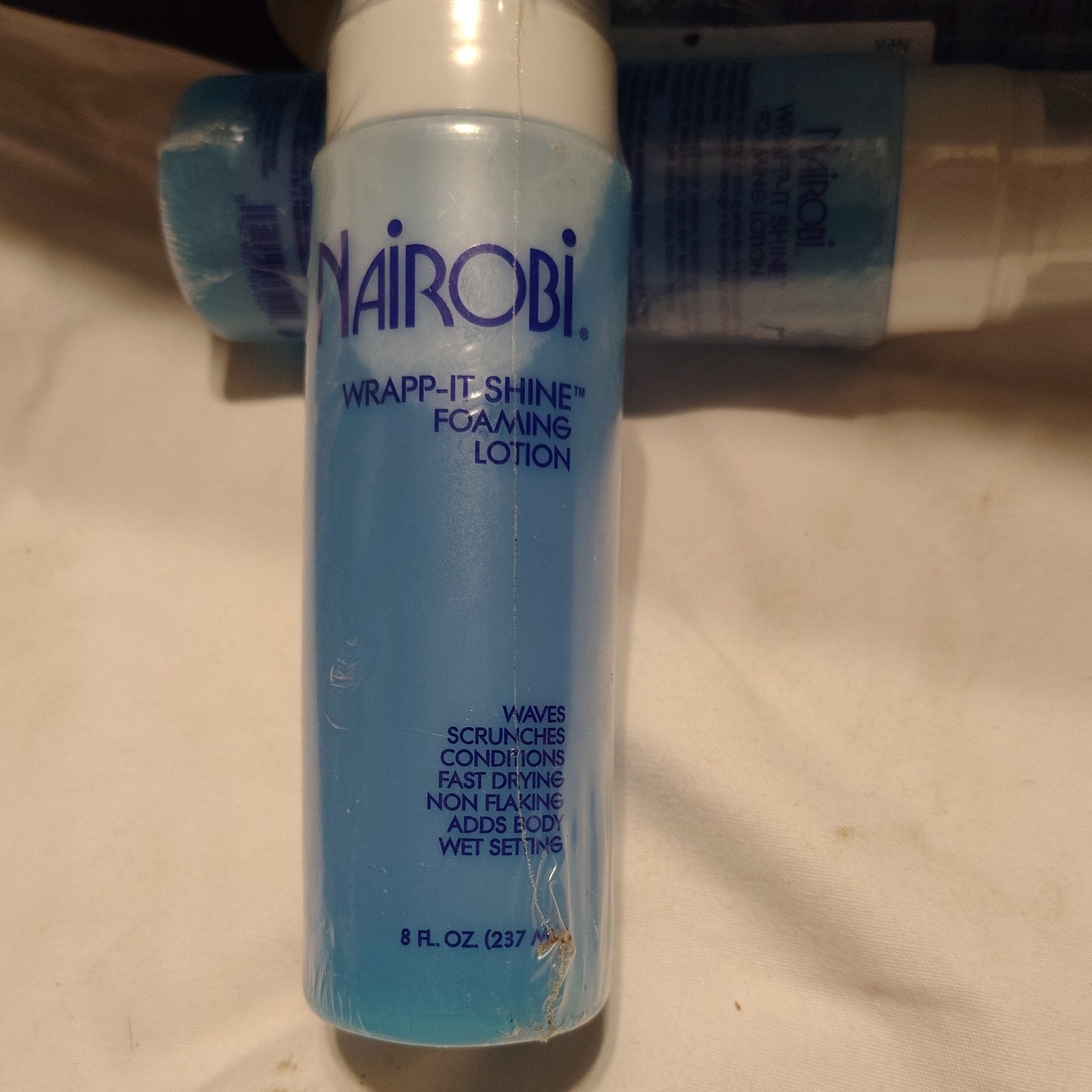 Nairobi wrapp-it shine loaming lotion 3 bottles 8oz each