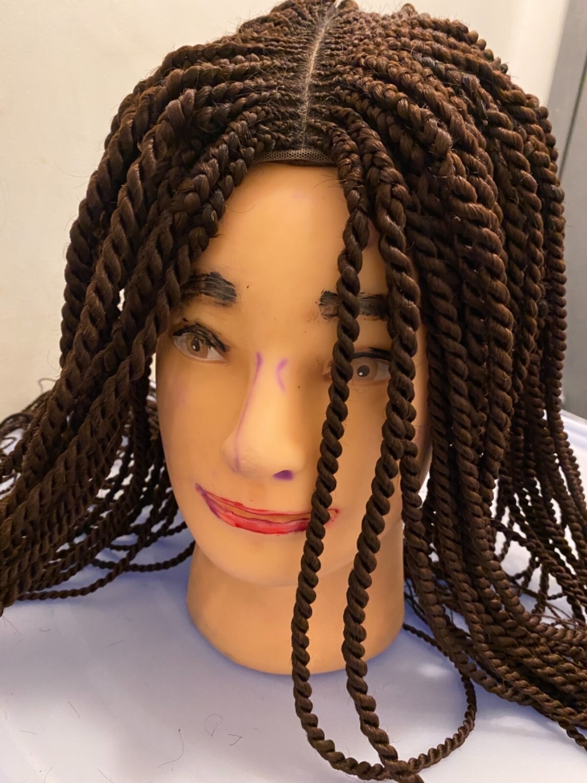 Corn roll with braided hair long