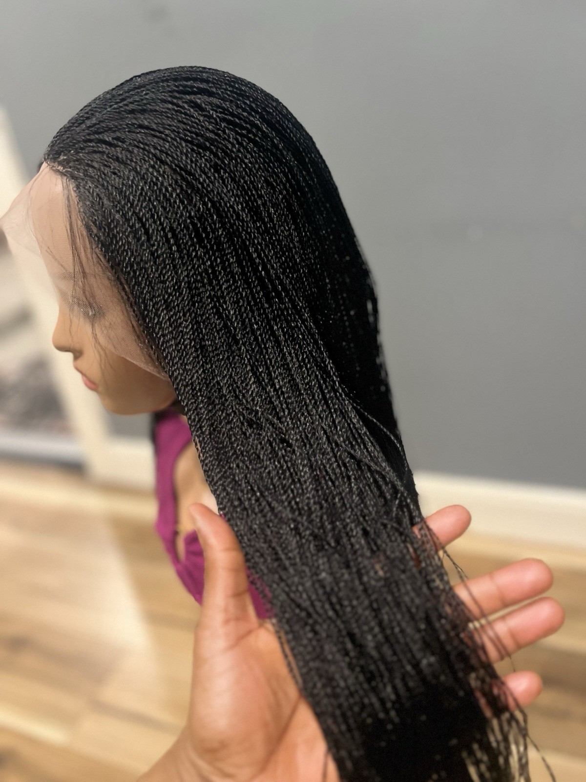 BRAIDED MICRO TWIST WIG . Madeon a full lace wig.length is 24”long..color black.