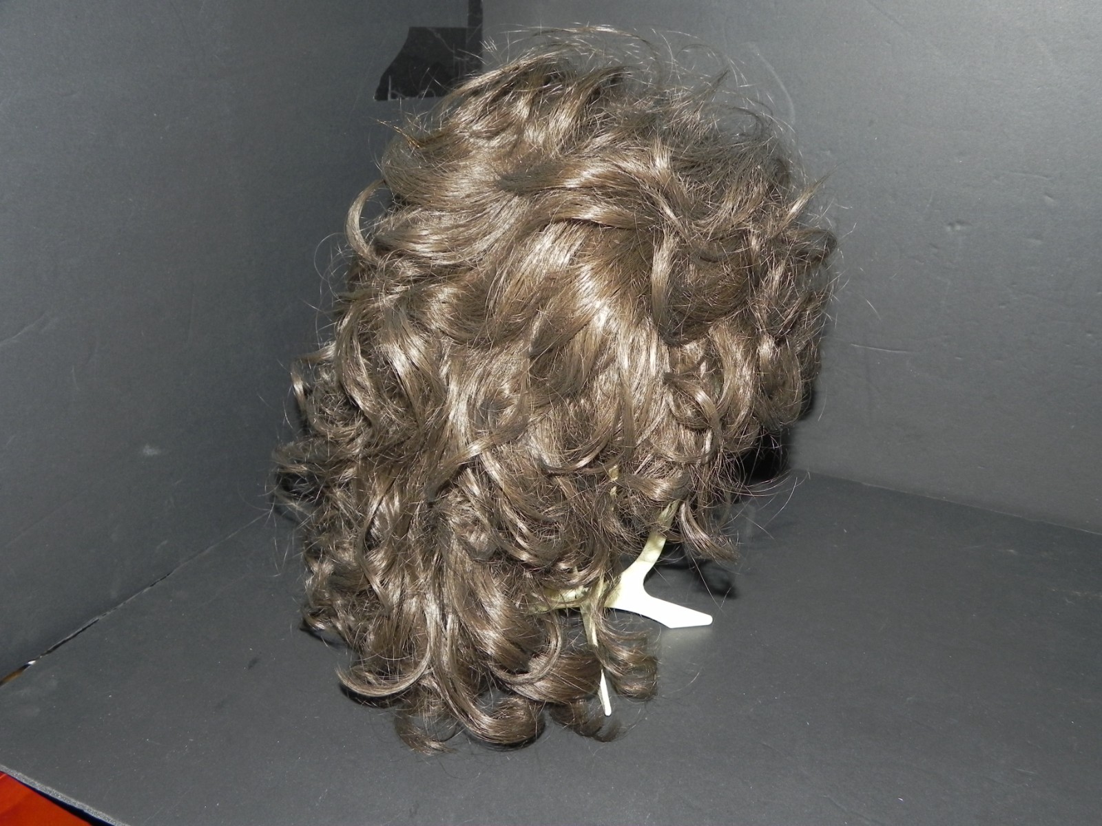 Adolfo Chocolate Brown Short Front Medium back Length Curley Wig – Rooted