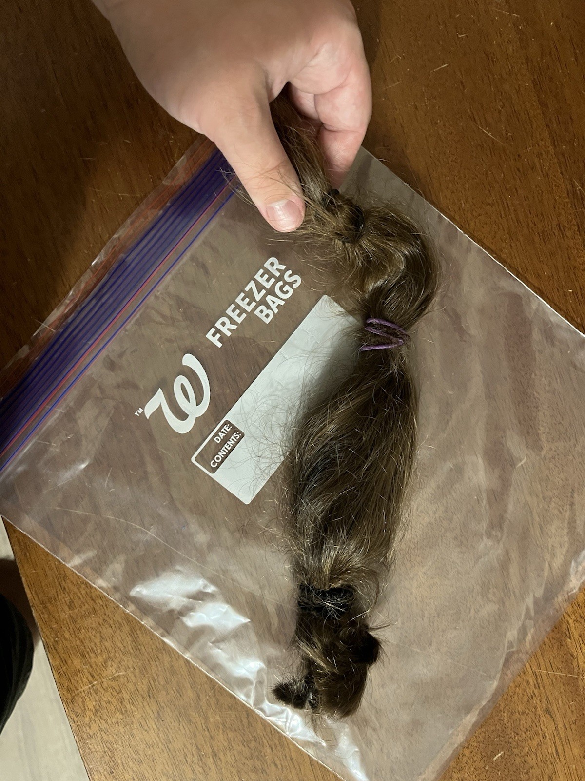 natural untreated medium/dark blonde hair, 11-12inch long, 3inch diameter