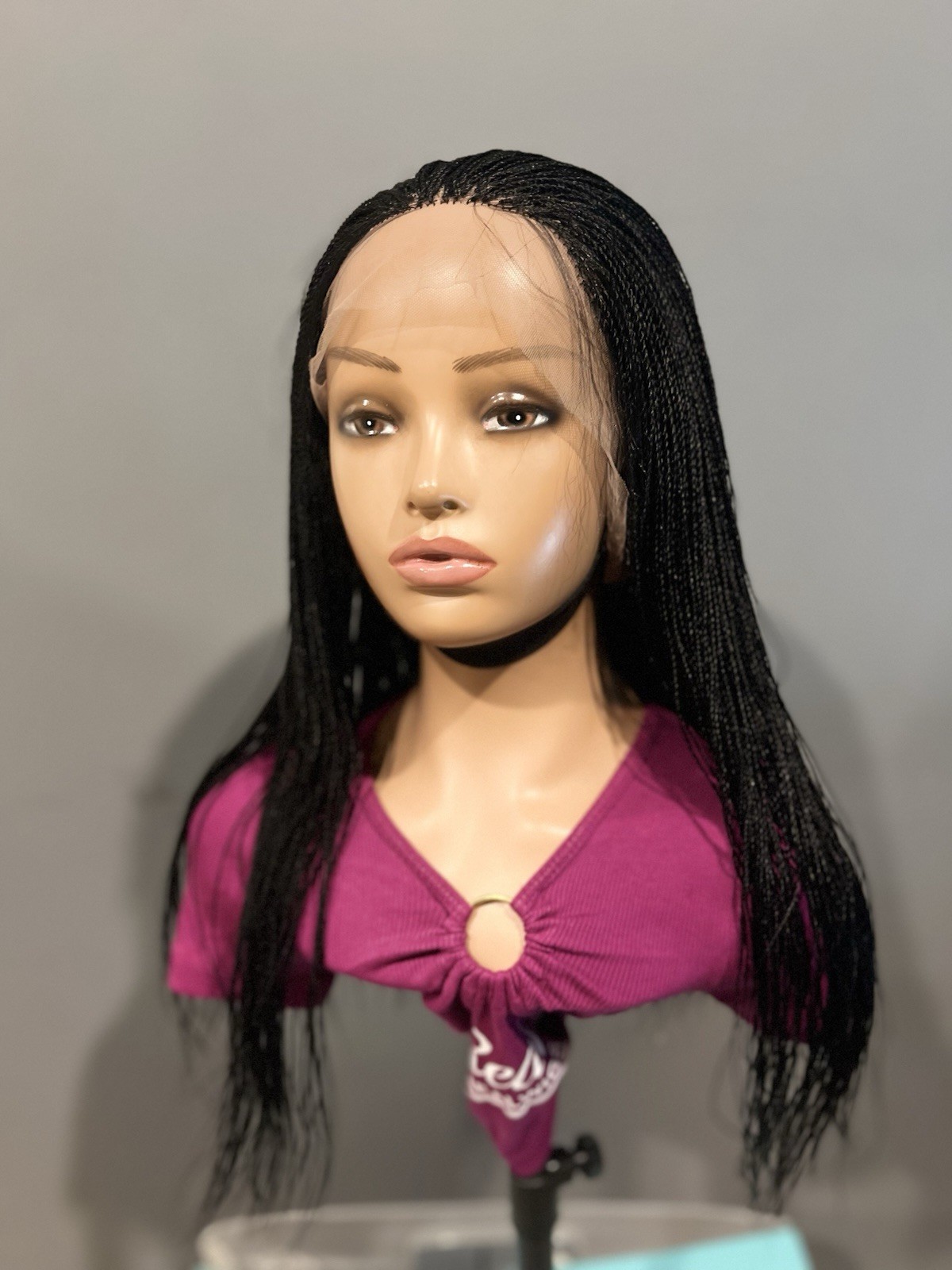 BRAIDED MICRO TWIST WIG . Madeon a full lace wig.length is 24”long..color black.