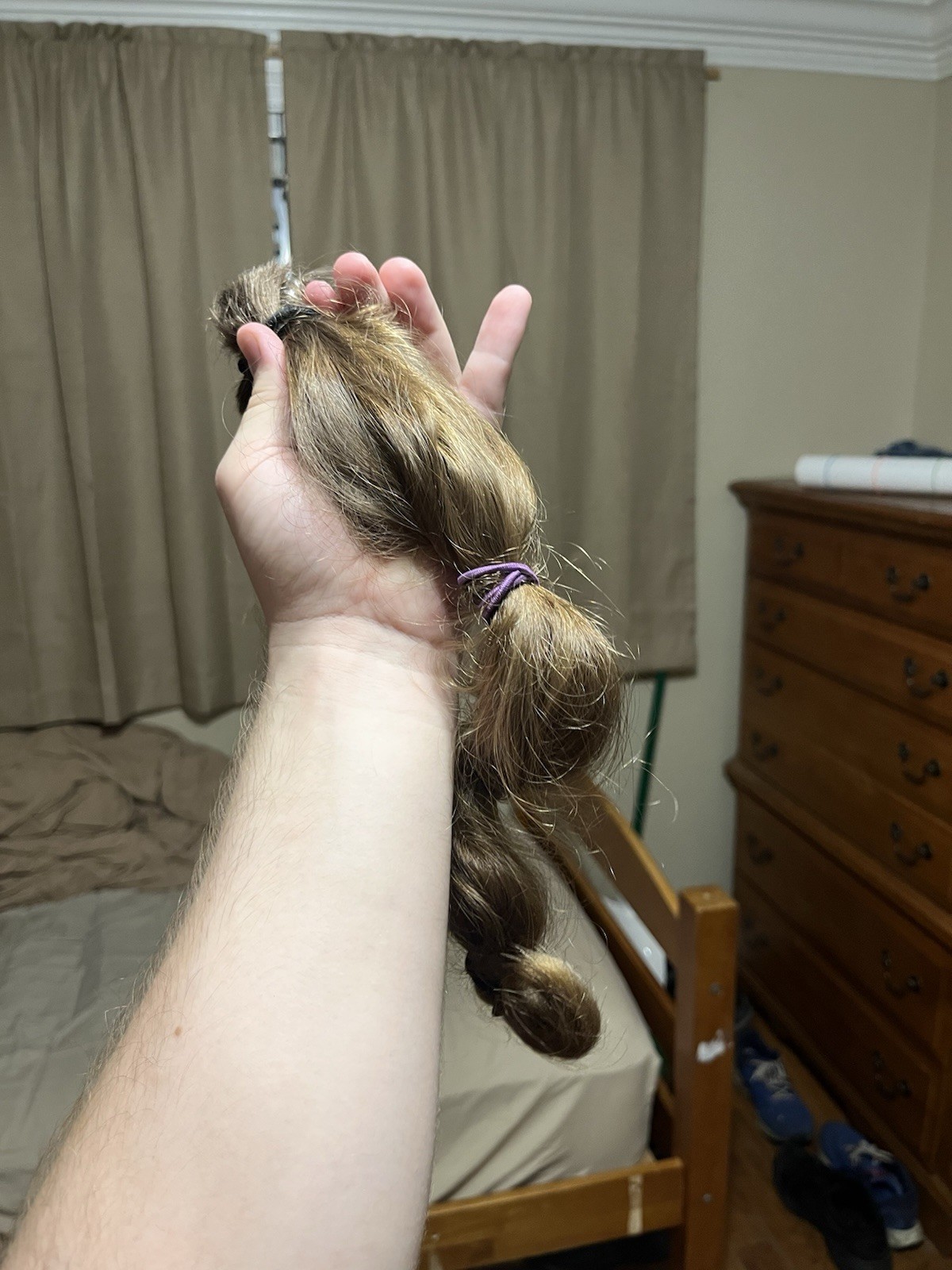 natural untreated medium/dark blonde hair, 11-12inch long, 3inch diameter