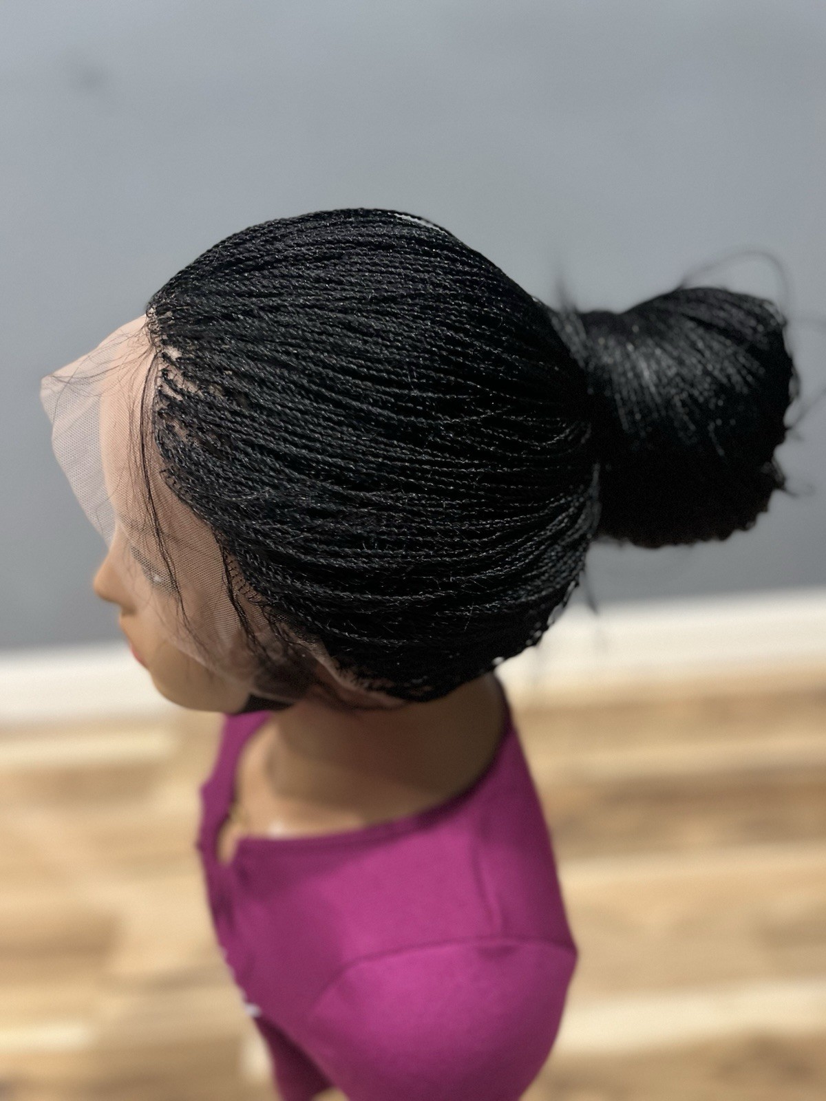BRAIDED MICRO TWIST WIG . Madeon a full lace wig.length is 24”long..color black.