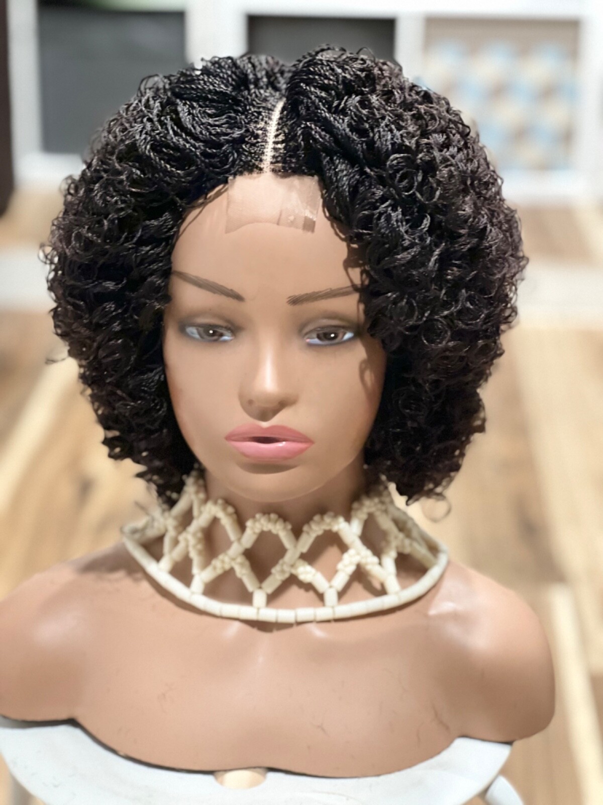 Braided micro twist afro curly wig. just as pictured. color is Brown mix