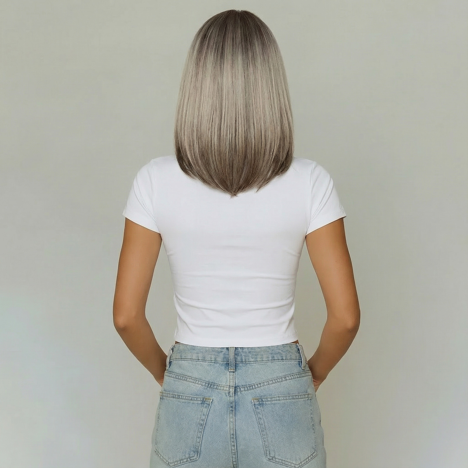 “Jenna” – Short Rooted Blonde Wig with Low Lites