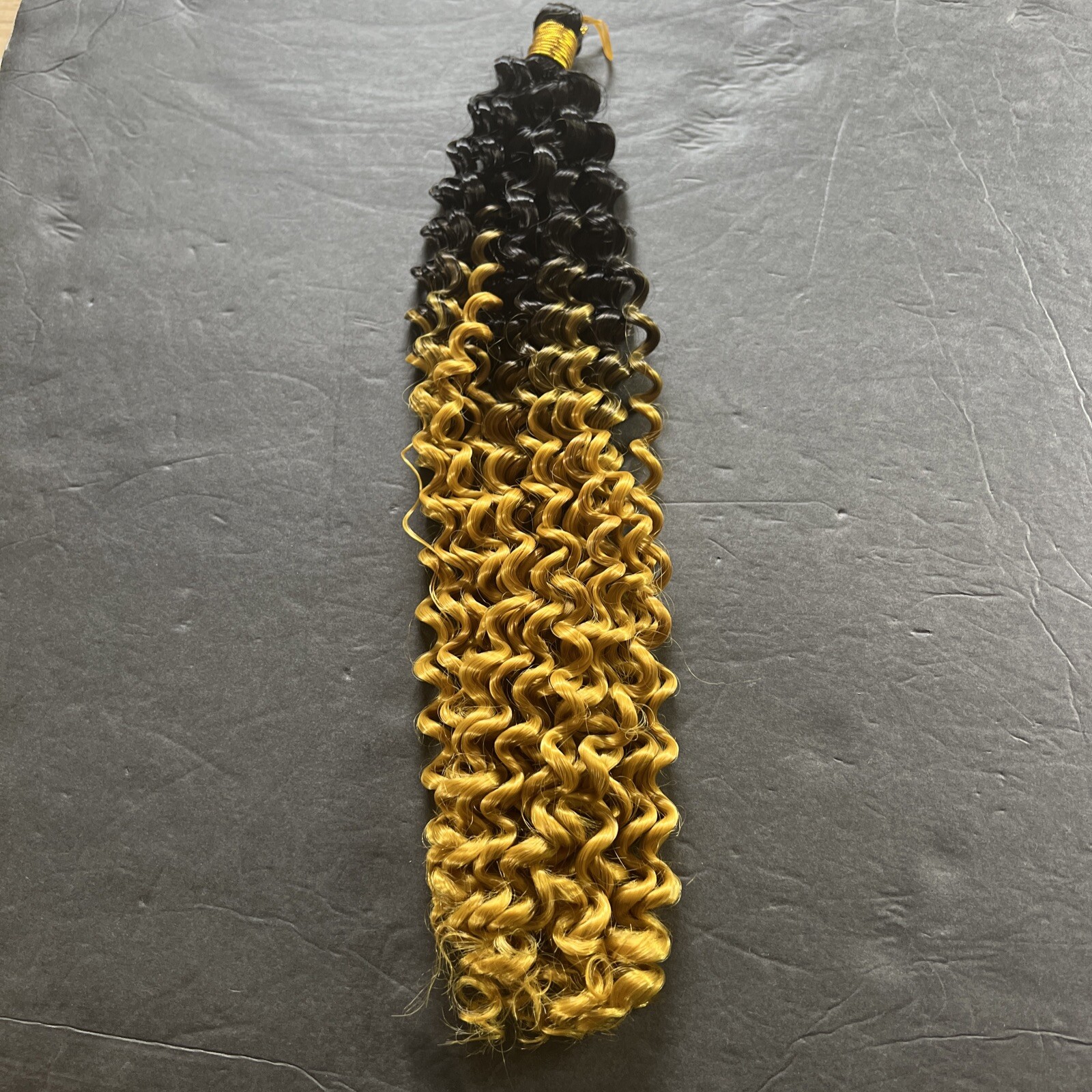 14 Inch Black To Yellowish Blonde synthetic, deep water Wavy Marlybob